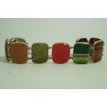 A Scottish pebble bracelet, composed of nine various agate rectangular panels,
