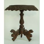 A Victorian Anglo Indian rosewood centre table, with elaborate pierced and carved decoration,