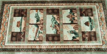 A Chinese silk and wool rug woven with landscapes and famous landmarks within multiple borders,