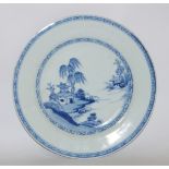 An 18th century Chinese porcelain plate, painted in blue with a landscape, Ex Nan King Cargo, 22.