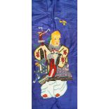 A Chinese silk panel, embroidered with an immortal on a bright blue ground, 154cm high,