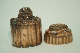 A large Victorian copper jelly mould with pineapple and fruit moulded top and cylindrical reeded
