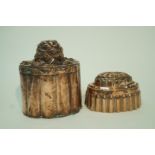 A large Victorian copper jelly mould with pineapple and fruit moulded top and cylindrical reeded