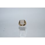 A sixteen stone diamond gentleman's cluster 9 carat gold ring,