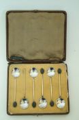 A cased set of silver bean end coffee spoons, 40g gross,