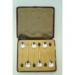 A cased set of silver bean end coffee spoons, 40g gross,