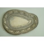 A silver coloured presentation salver, designed in the out line of Sri Lanka (Ceylon),