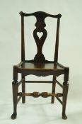 A George III country beech chair, with pierced splat, solid seat,