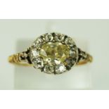 A George III yellow diamond and diamond cluster ring,