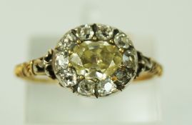 A George III yellow diamond and diamond cluster ring,