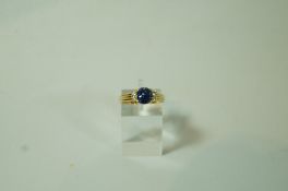A sapphire and diamond 18 carat gold ring,
