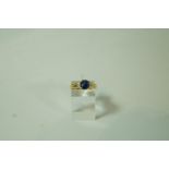 A sapphire and diamond 18 carat gold ring,