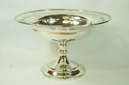 A silver comport, Chester 1915, the shallow bowl with pierced decoration to the rim,