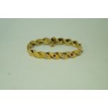 A diamond and ruby bracelet, continental mark to the catch,