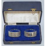 A pair of heavy silver napkin rings, by J.B.G.