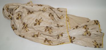 A pair of lined and interlined chintz curtains printed with acorns,