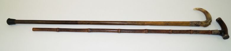 Two silver mounted walking sticks, one with a horn grip,