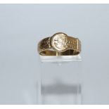 A 9 carat gold buckle ring, Birmingham 1964, finger size O, 2.