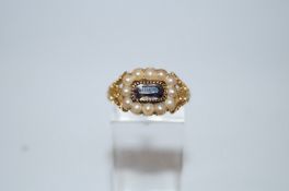 A Victorian amethyst and split pearl ring, circa 1865,