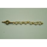 A cultured pearl bracelet, stamped '750', 6.