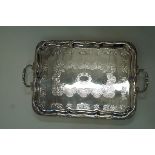 A silver plated two handled tray, of rectangular outline, with foliate decoration, 66.