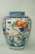 An 17th century Chinese porcelain vase, painted with chrysanthemum in blue,