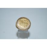 A 1982 half sovereign, in a 9 carat gold ring mount, finger size T1/2, 11.