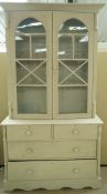 A Victorian pine dresser, later painted with a raised glazed plate rack above,