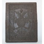 A late 18th century impressed tea block, with moulded coat of arms,