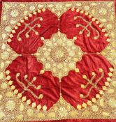 A mid 20th century Indian velvet table cloth with central gold and silver embroidered medallion,