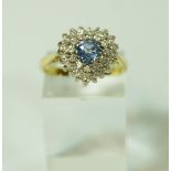 A sapphire and diamond heart cluster 18 carat gold ring,