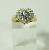 A sapphire and diamond heart cluster 18 carat gold ring,