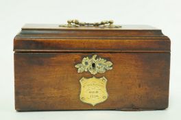 A George III mahogany tea caddy, with elaborate cast gilt metal handle,