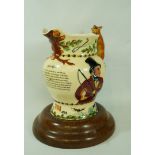 A Crown Devon "John Peel" musical jug, printed factory marks  Rd No 755789, on later turned stand,