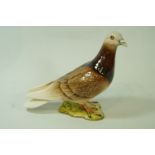 A Beswick model of a pigeon, the wings with two stripes, moulded marks 1383B,