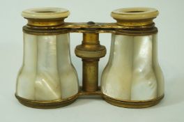 A pair of Victorian opera glasses, with inlaid mother of pearl and gilt case, 6.
