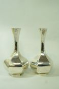A pair of silver vases, maker T&Co (Tiffany and Co?), London 1972, of octagonal baluster form,
