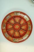 A 19th century Pope Joan board, revolving on a flared foot,