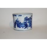 A Chinese cylindrical vase, painted in underglaze blue with figures in a landscape,