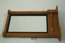 A Regency rectangular wall mirror, later gold painted, with black reeded slip, 63.