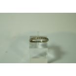 A diamond eternity ring, set with twenty six small old single cut stones,