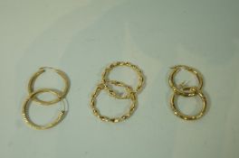 Three pairs of 9 carat gold hoop earrings, 4.
