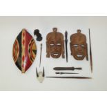 A small collection of mid 20th century African souvenirs, including a painted shield,