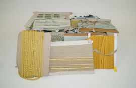 A large collection of upholsterers braiding, mainly yellow,