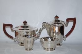 A silver four piece matched tea service, Birmingham 1937 and 1938,