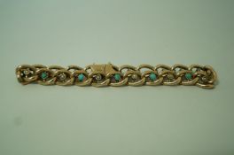 A turquoise and seed pearl bracelet, stamped '9ct', circa 1900, the hollow curb links alternate set,