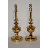 A pair of late 20th century brass table lamps, in 17th century style,