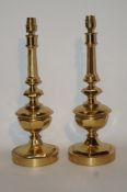 A pair of late 20th century brass table lamps, in 17th century style,