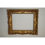 A pair of carved wood and gilded picture frames,