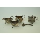 A collection of silver items, comprising; a cream jug, Birmingham 1903; a pair of small sauce boats,